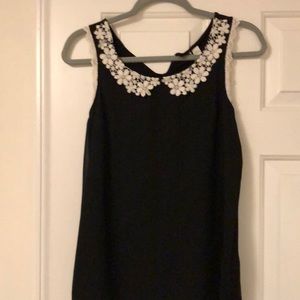 Black sleeveless blouse